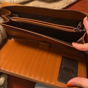 Brown leather Michael Kors wristlet